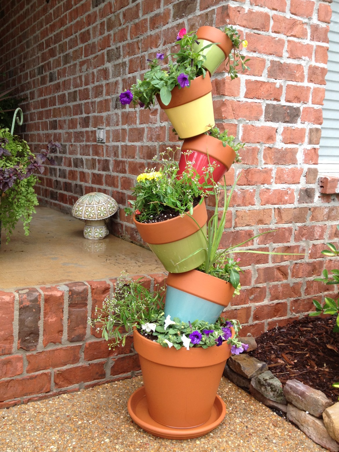 Cleverly stacked pots can make an amazing dramatic effect -- and make people stop in wonder.