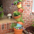 Cleverly stacked pots can make an amazing dramatic effect -- and make people stop in wonder.