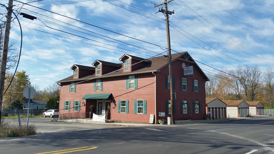 Their garden is that tiny plot out back, not the storage sheds behind it.